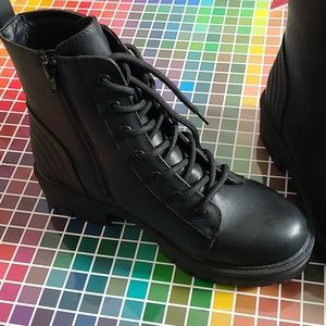 Zipper-up heeled combat boots